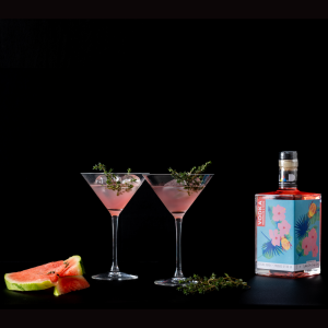 MAD Craft Vodka Watermelon & Thyme bottle featuring Art by Alice Bulmer © Modern Art Distillery 2023 Series 1 'Connections' and two glasses to taste